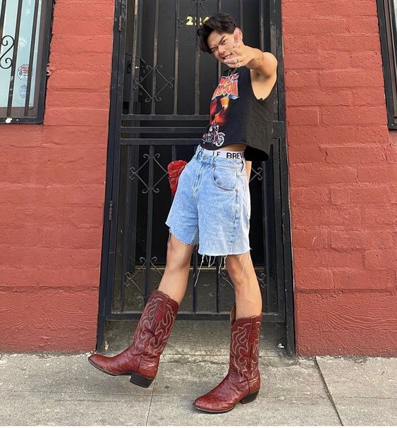 Graphic Tee with Denim Shorts and Red Boots